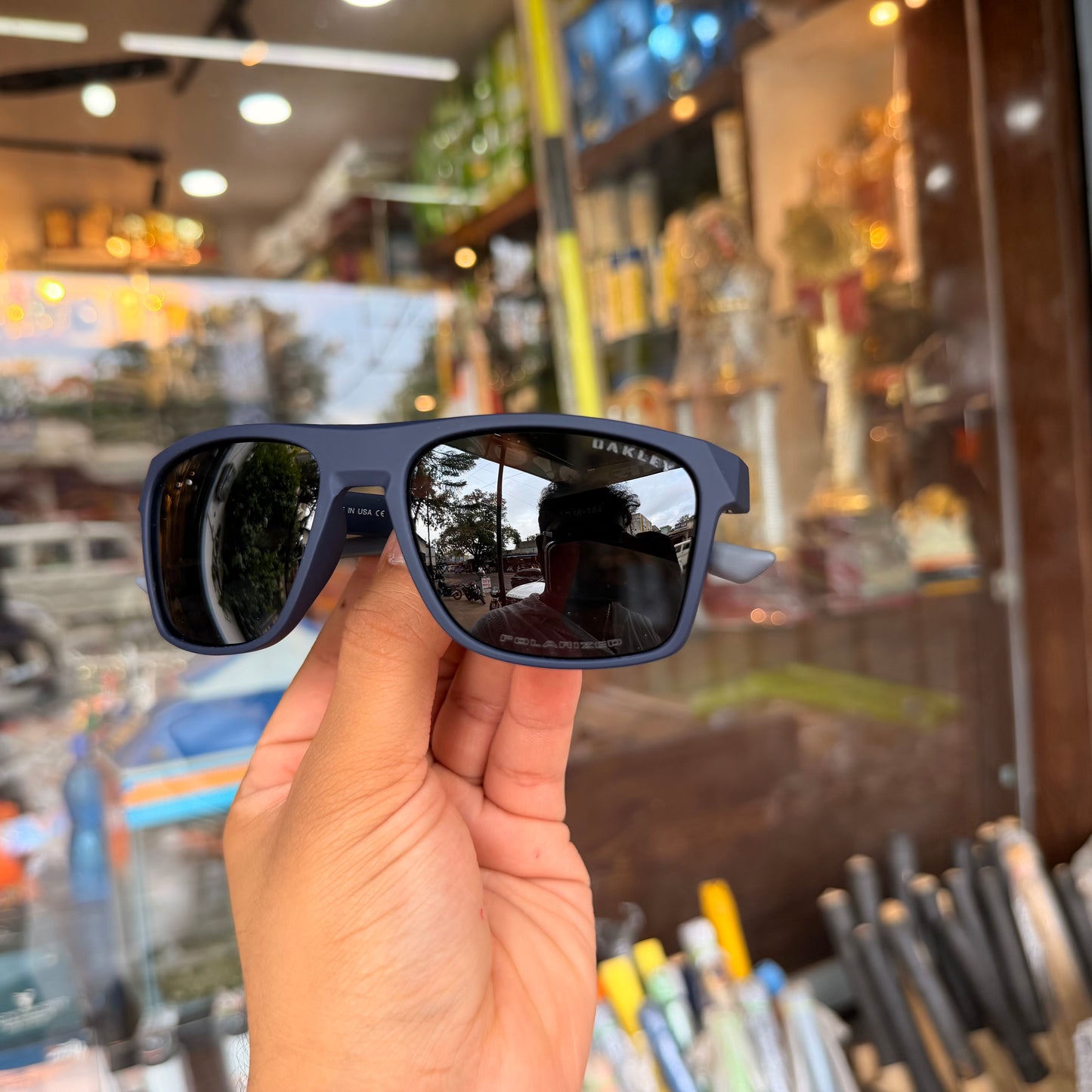 OAKLEY Polarised TO4914 Blue-Grey Premium Sunglasses